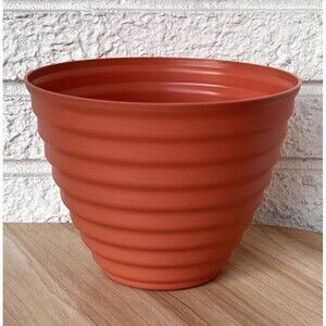 Ribbed Plastic Planter Flower Pot Orange Round Cone Shape Pop Out Draining Holes